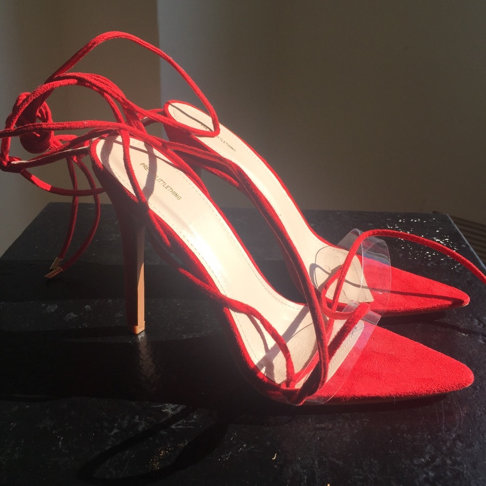 Translucent and Red lace up stilettos